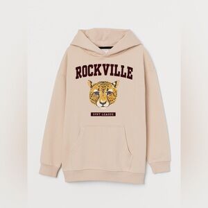 Kelzuki x H&M Flock-print hooded top in light beige with a leopard print